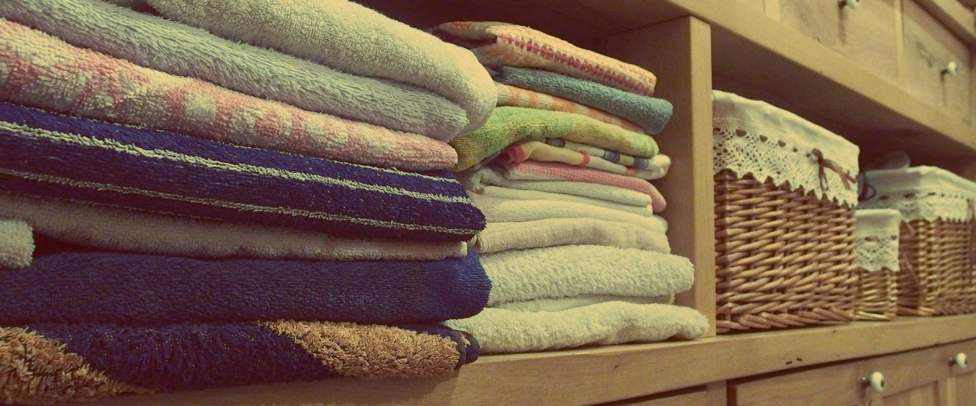 Fresh folded linen on a shelf, the exact mood fresh linen melts capture