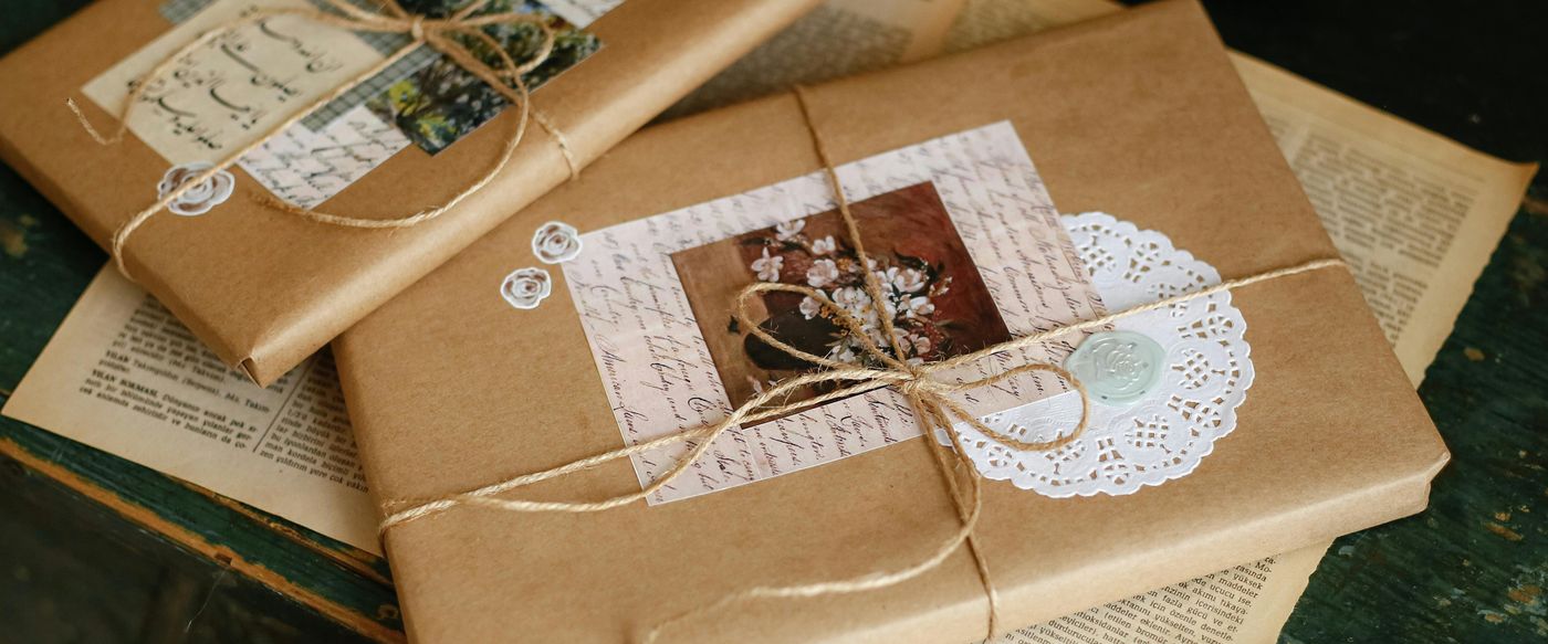 Gifts wrapped in kraft paper and twine, ideal for the best scented candles Australia gifting
