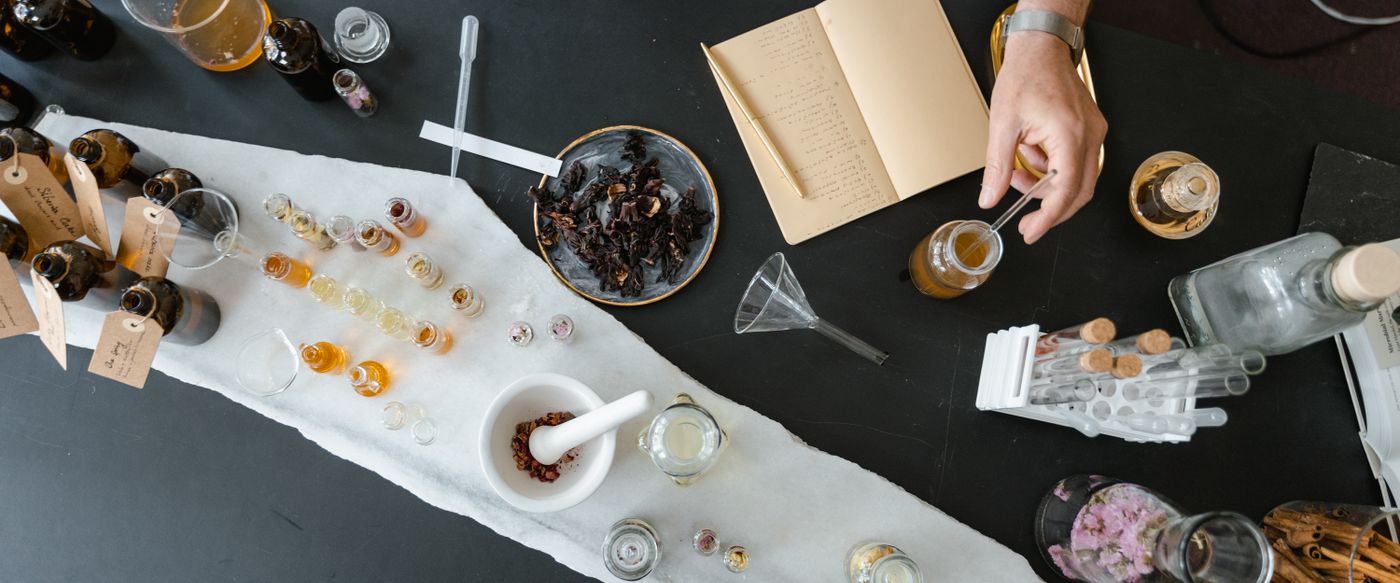 Natural ingredients and oils arranged for aromatherapy candles at home